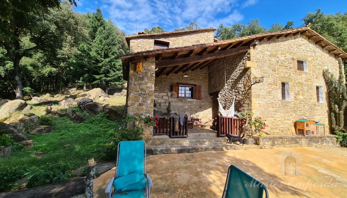 Terrace of the facade of the house with the swimming pool