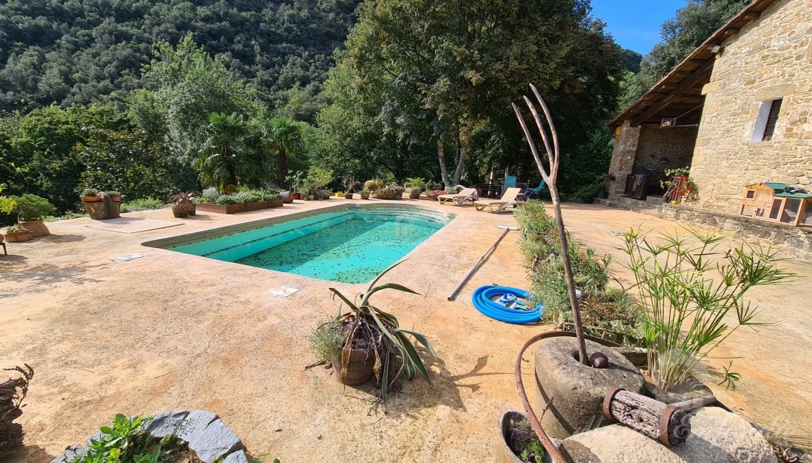 Terrace of the facade of the house with the swimming pool