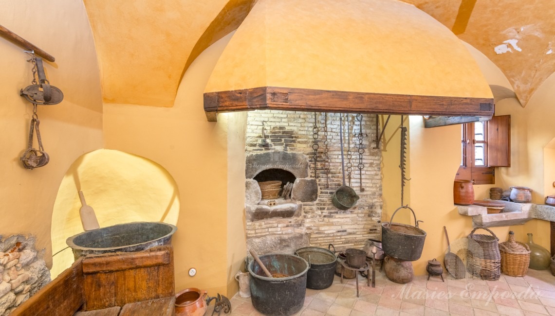 Fireplace in the farmhouse’s old kitchen