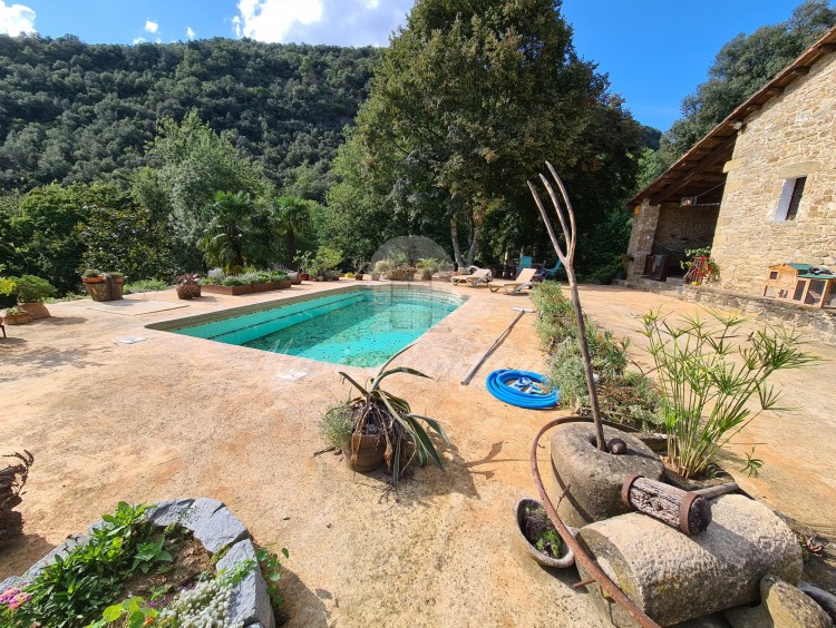 Terrace of the facade of the house with the swimming pool