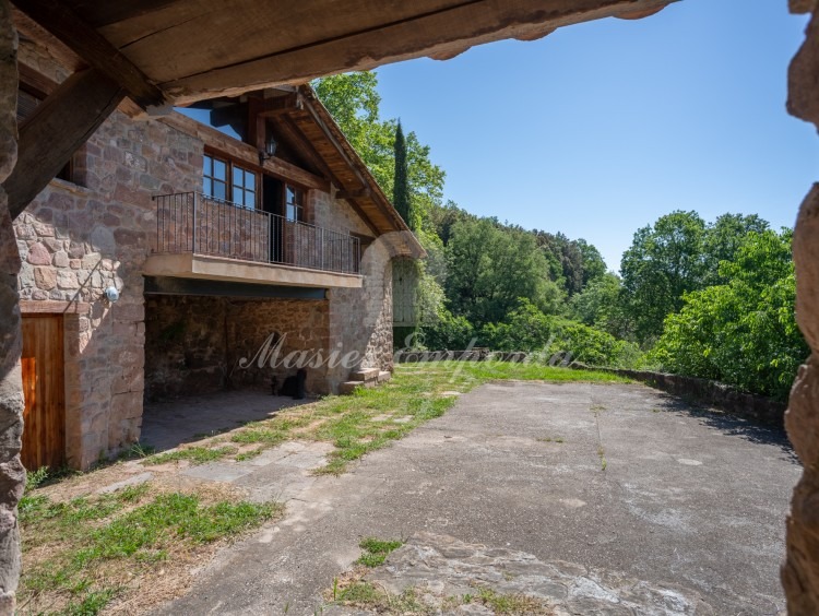 View of the threshing floor and the entrance to the farmhouse