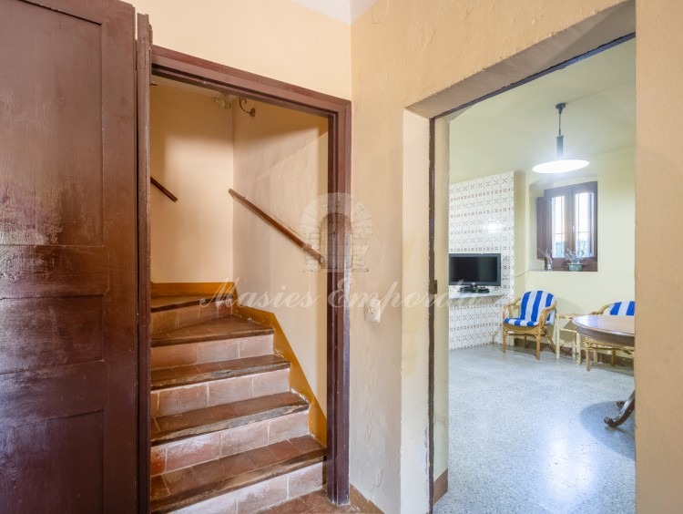 Entrance to the kitchen and staircase leading to floors