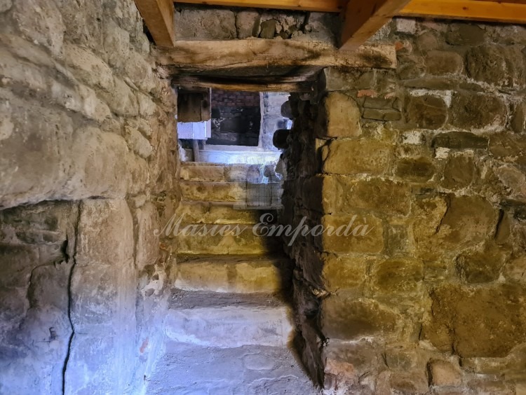 Staircase to the ground floor from the ground floor of the farmhouse